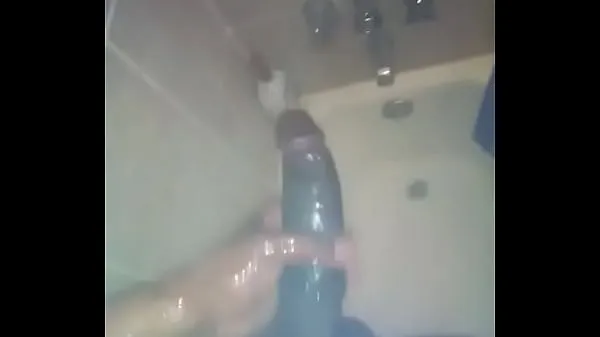 Vis Stroking big black dick in shower mine film